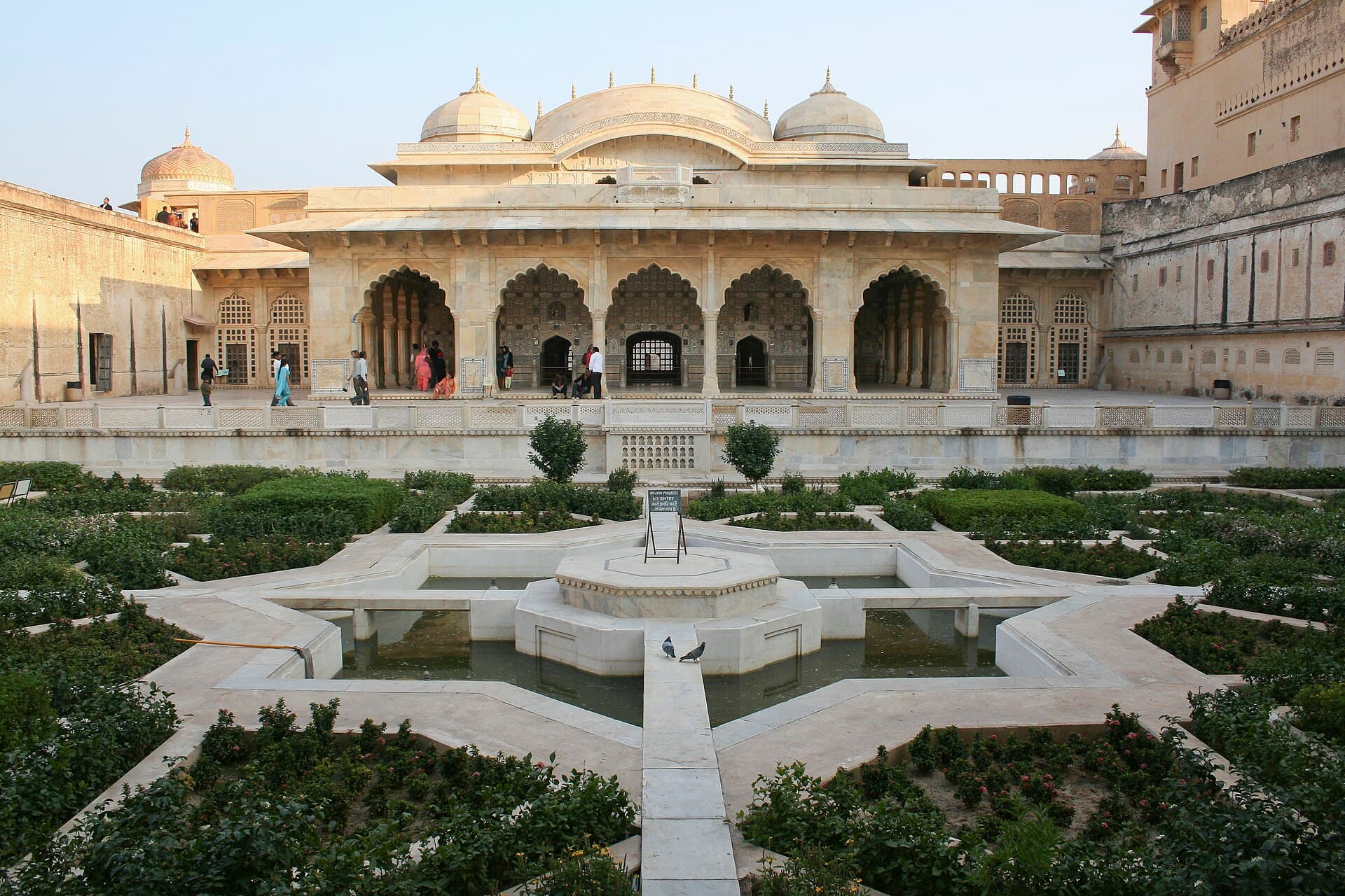 Marble pavilion and star-shaped garden pool in the courtyard of Amber Fort, Jaipur
