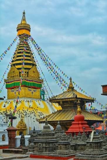 The Swayambhunath stupa in Kathmandu, its golden spire strung with prayer flags
