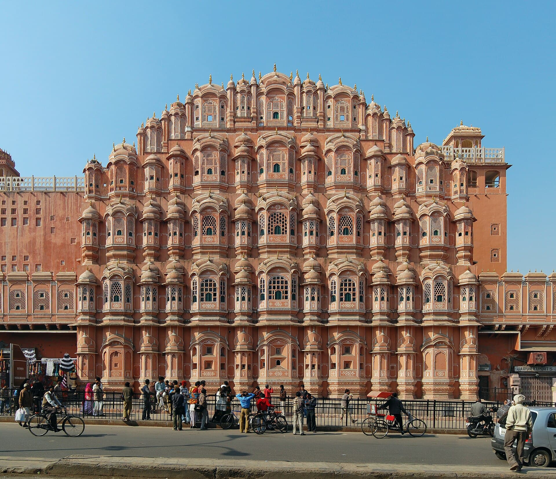 The pink sandstone facade of Hawa Mahal in Jaipur
