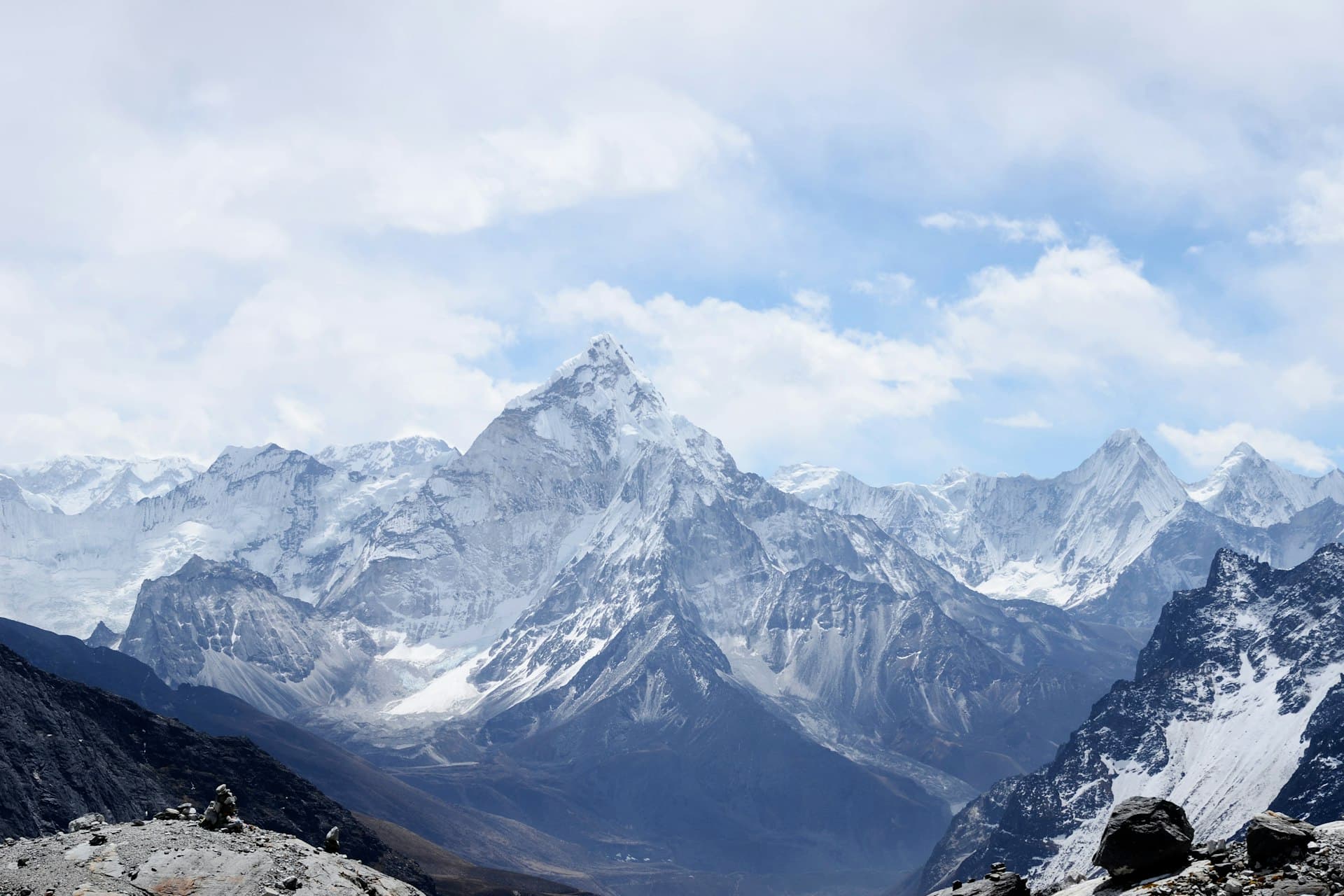 Snow-covered Himalayan massif under cloud on the road through Spiti